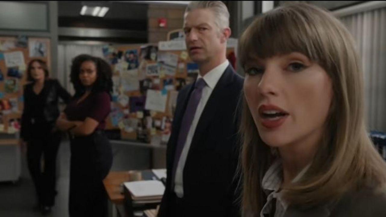 Image of Taylor Swift and other cast members.