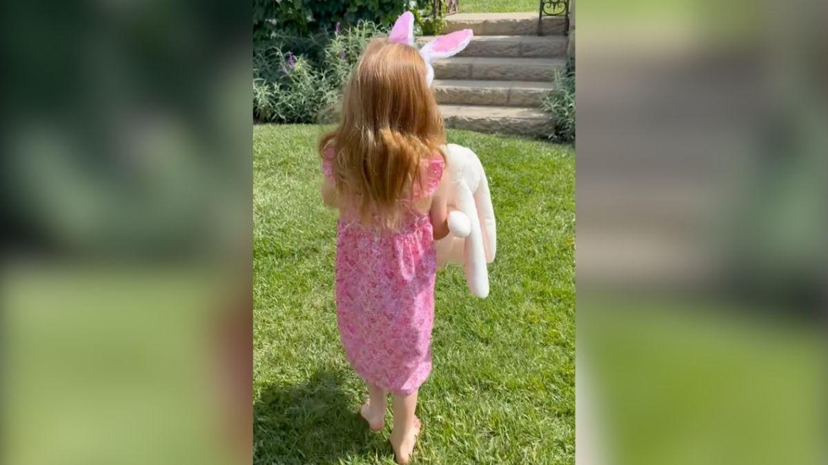 Image of Princess Lilibet was walking through the garden.