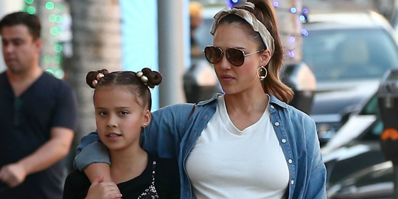 Jessica Alba juggles baby Haven and a Prada bag as she steps out