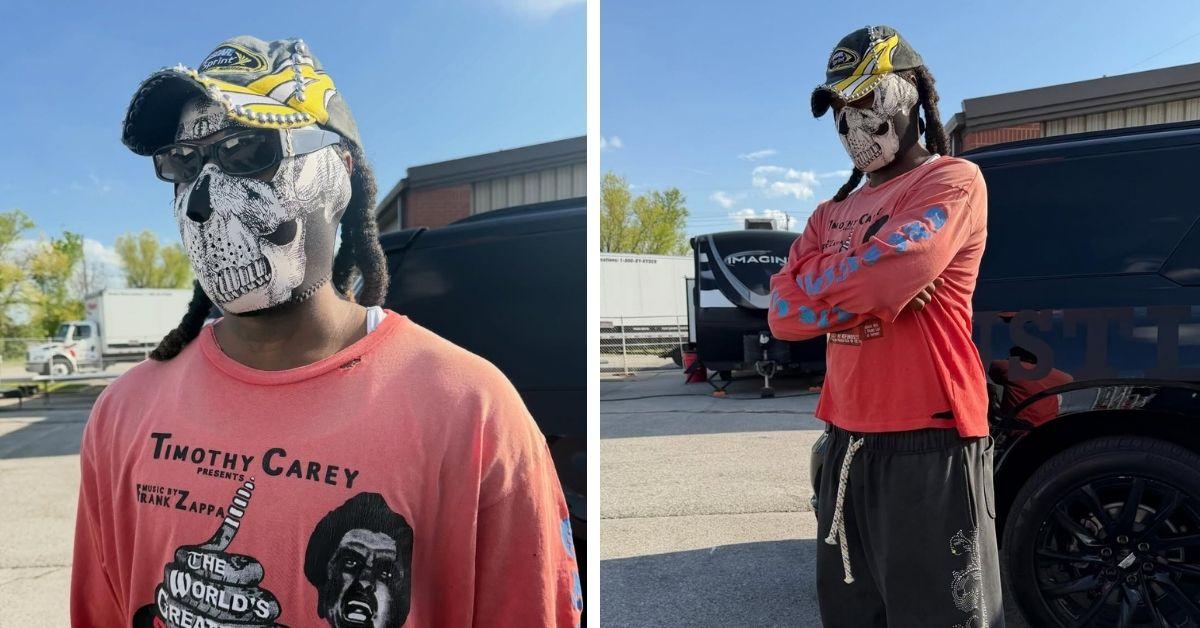 image of The rapper was seen performing from a wheelchair before dramatically standing up and continuing his set in front of an energized crowd.