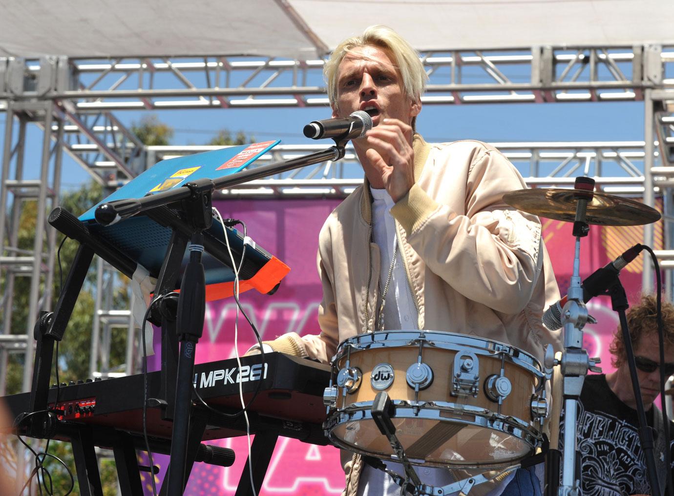 Aaron carter playing drums ons stage