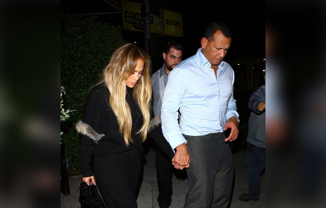 EXCLUSIVE: Jennifer Lopez holds hands with Alex Rodriguez as they leave Italian restaurant Osteria Mozza after having a romantic dinner