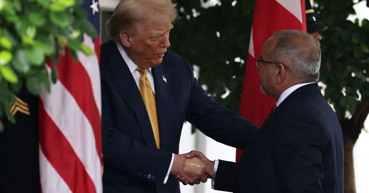 Photo of the president has been covering up his bruised hands with makeup.