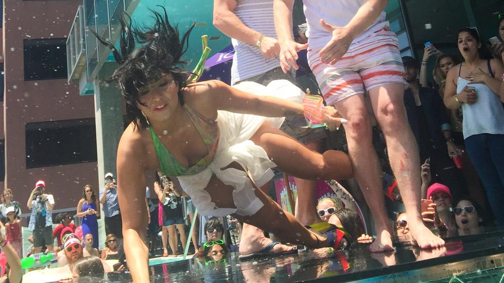 Demi Lovato takes a fall during KISS FM Summer Pool Party