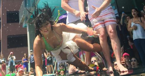 Demi Lovato takes a fall during KISS FM Summer Pool Party