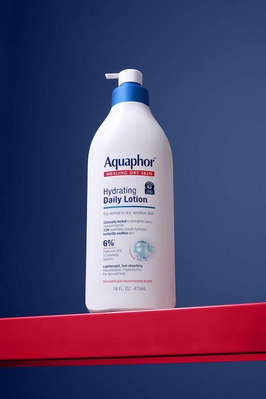aquaphor hydration lotion blue background