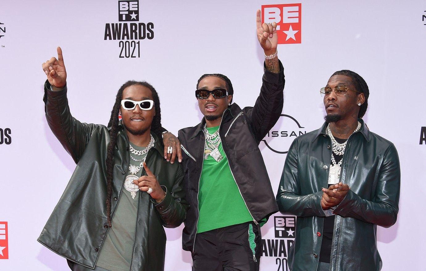 Can't look away at picture of Quavo, Takeoff, and Tom Brady