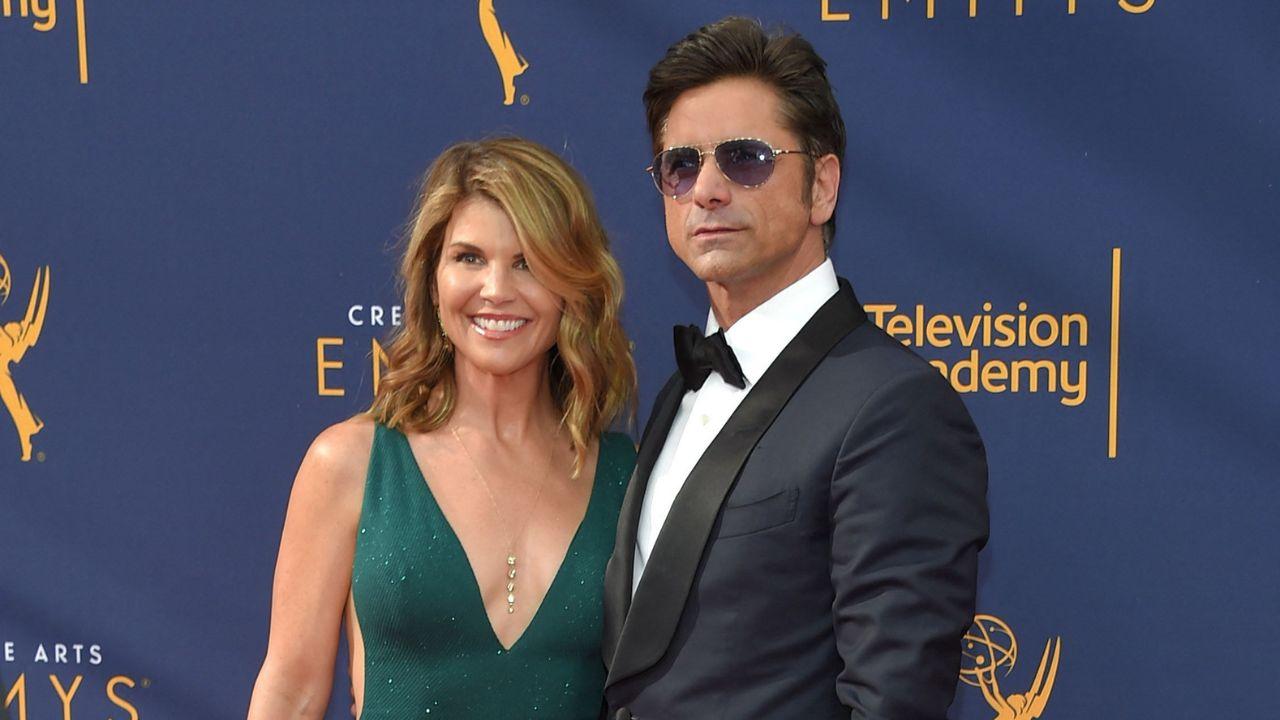 Image of John Stamos expressed sympathy for Lori Loughlin while reflecting on her difficult experience.