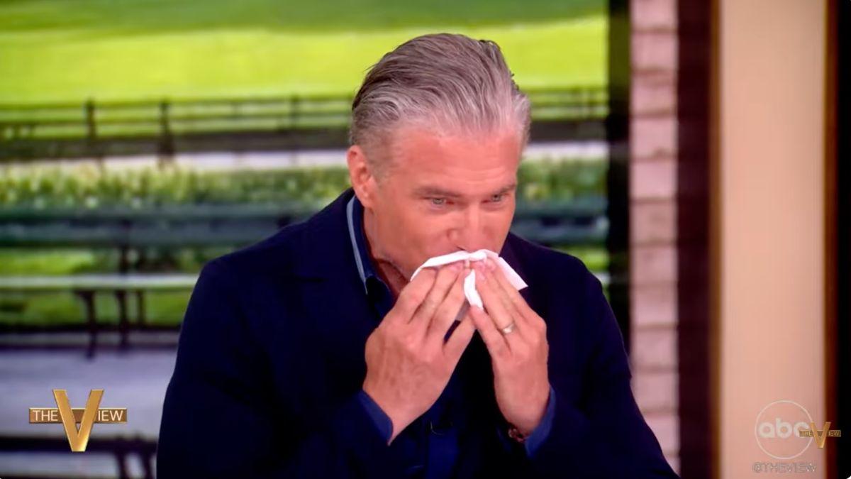 photo of The 'Crossroads' star wiped off Joy Behar's lipstick.