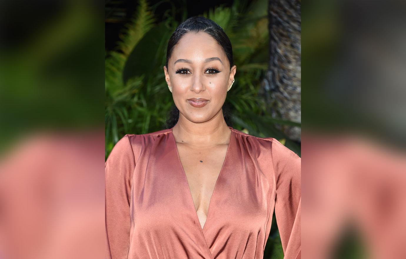 tamera mowry wearing satin dress