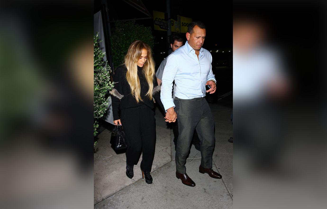 EXCLUSIVE: Jennifer Lopez holds hands with Alex Rodriguez as they leave Italian restaurant Osteria Mozza after having a romantic dinner