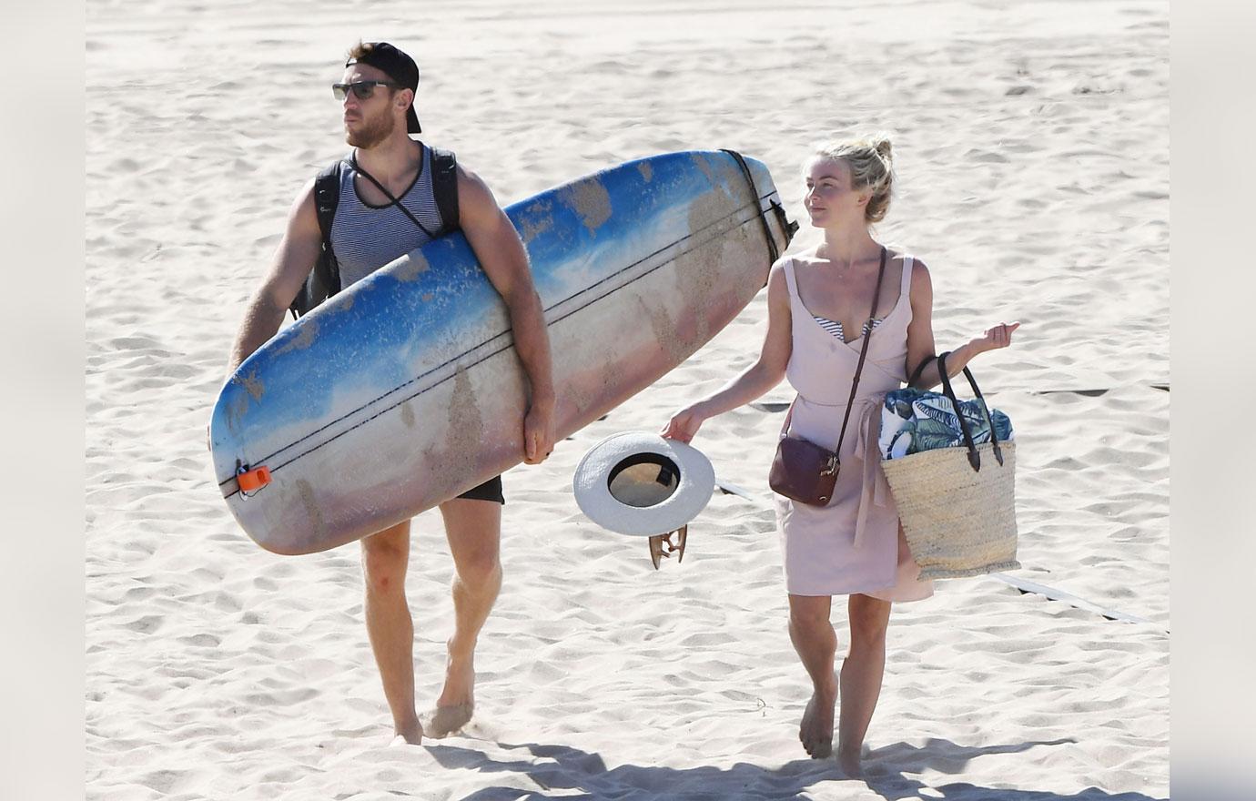 EXCLUSIVE: Julianne Hough wears a tiny bikini at the beach while playing Spike Ball with surfing husband Brooks Laich