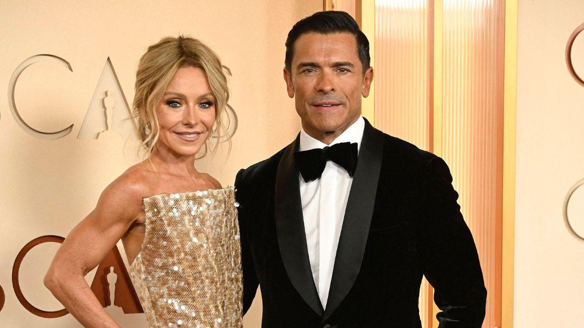 Image of Kelly Ripa told Conan O'Brien he wasn't her 'type' while pointing to her husband Mark Consuelos' features.