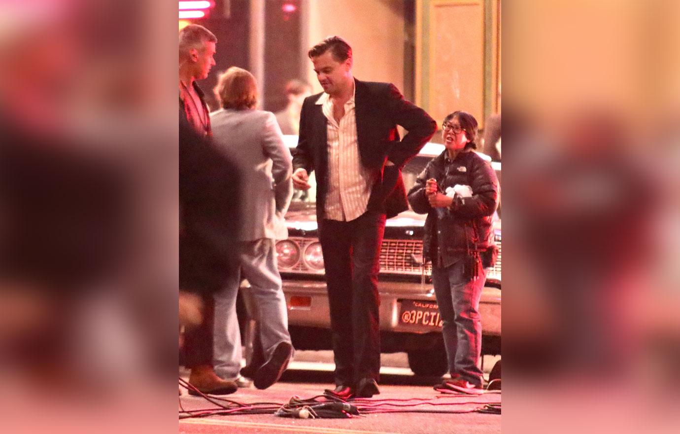 EXCLUSIVE: Leonardo Di Caprio crashes car and is put into police car film scene for Once Upon a Time in Hollywood