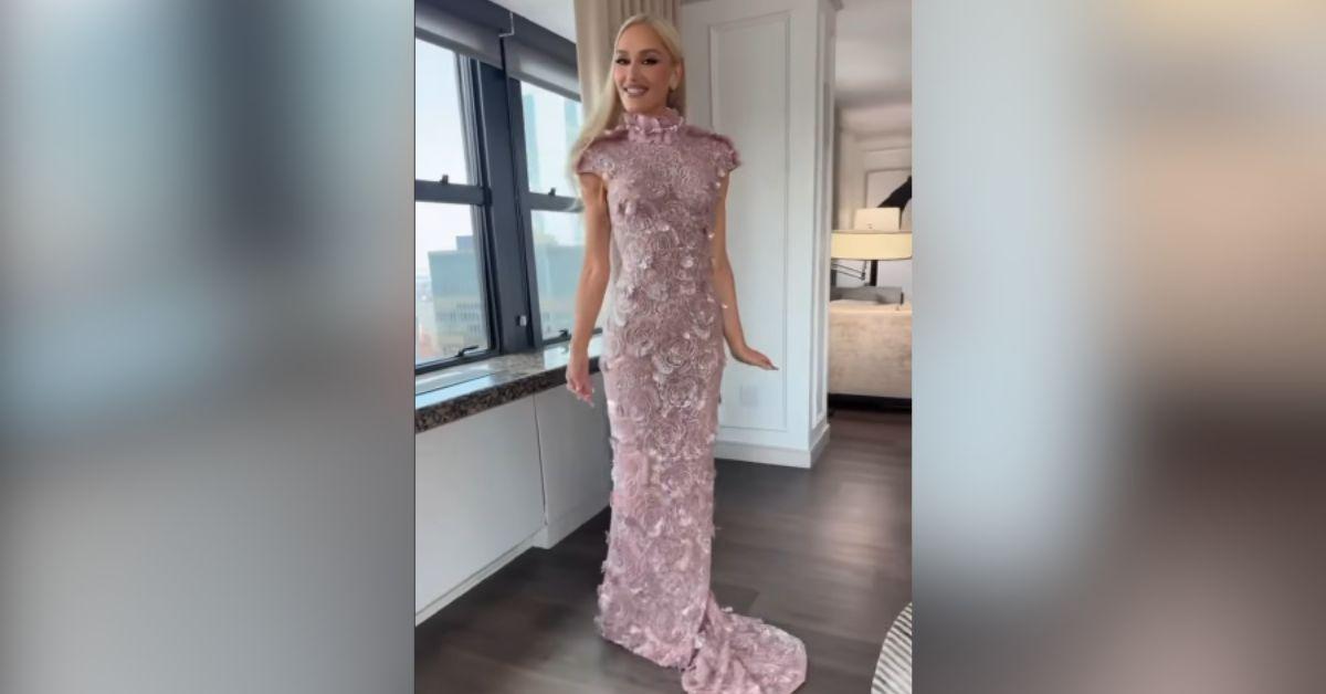 image of Blake Shelton wore a classic black tuxedo while Gwen Stefani stunned in a blush pink gown designed by Yara Shoemaker.