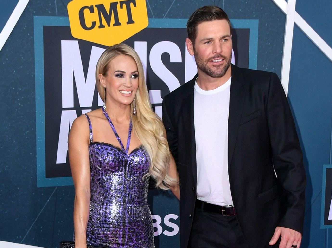 carrie underwood mike fisher prioritize marriage frustrated