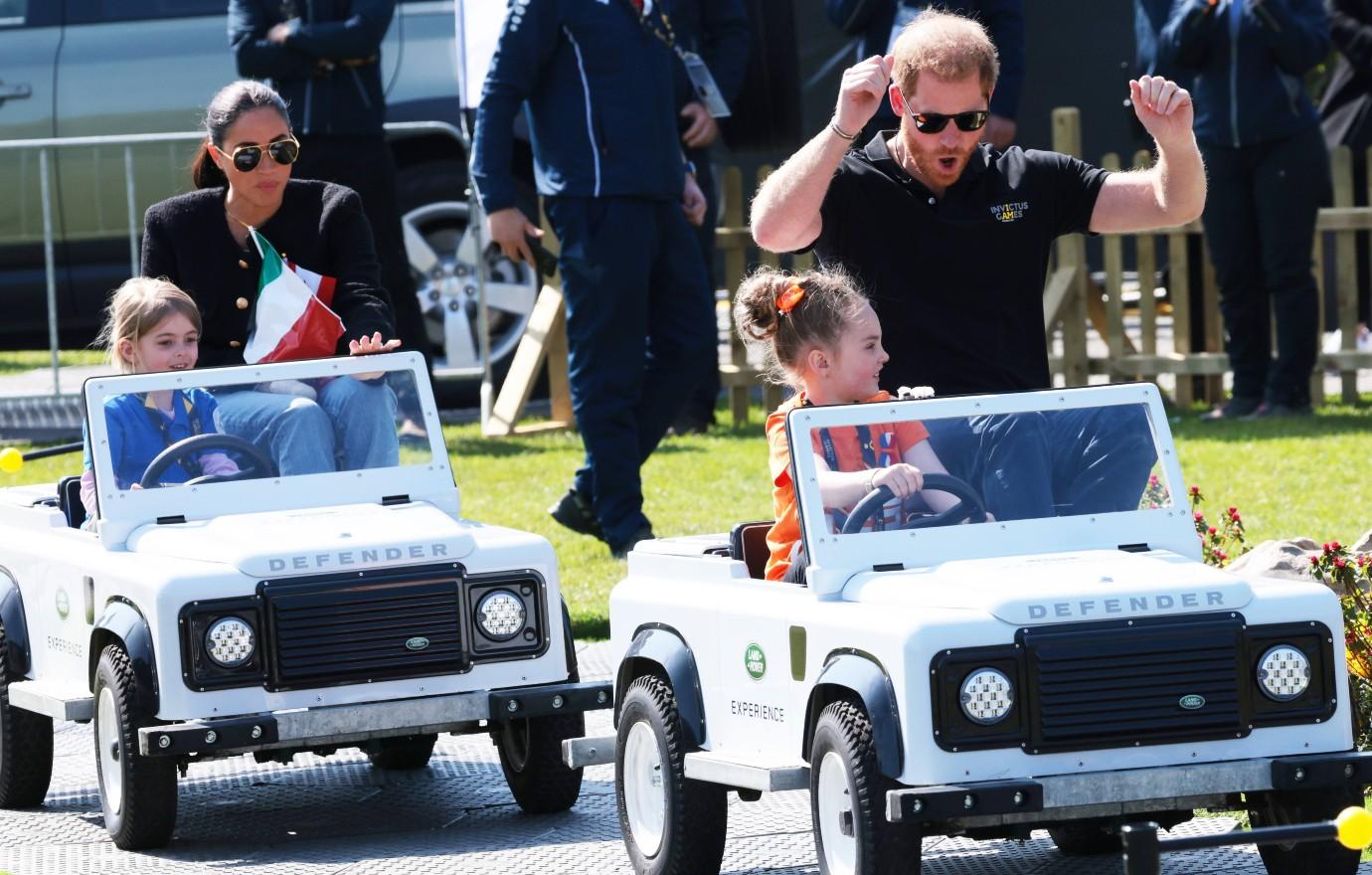 prince harry meghan race kiddie cars invictus games