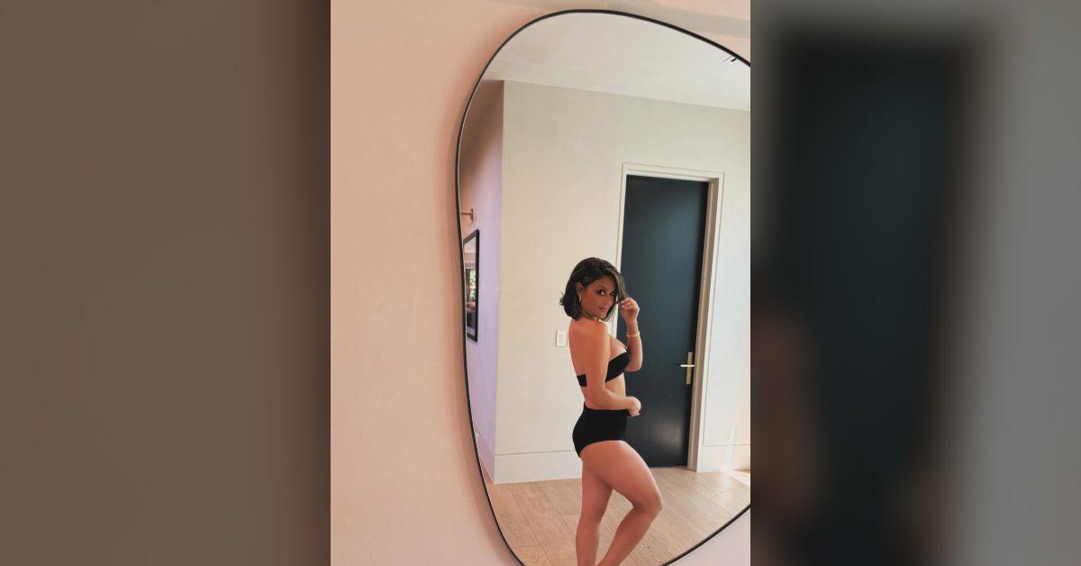 image of Vanessa Lachey posed seductively in the mirror.