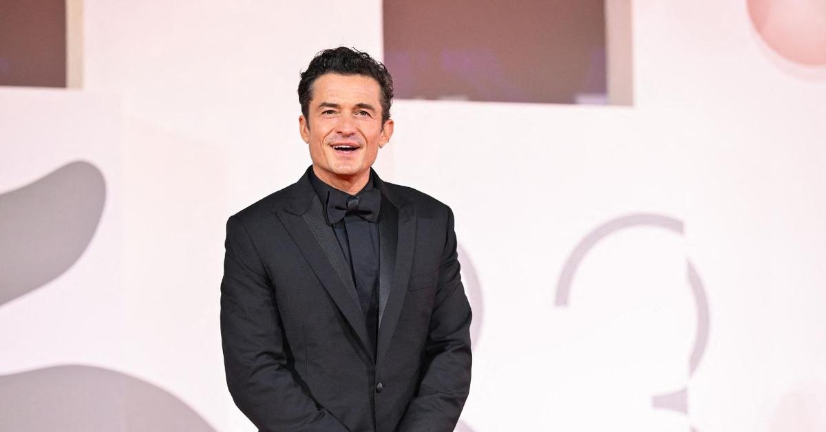 Orlando Bloom Shows Off His Washboard Abs in Rare Photo With Daughter Daisy