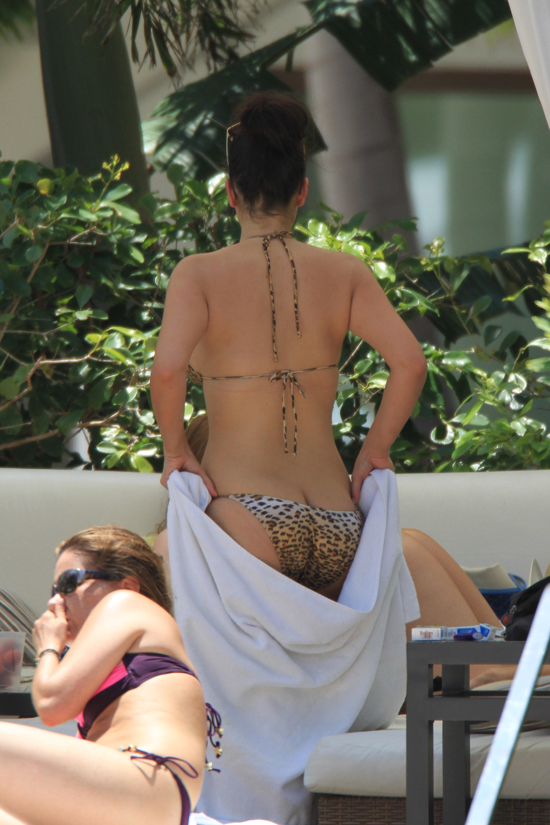 Kim  Kardashian seen bikini pool side in Miami Beach