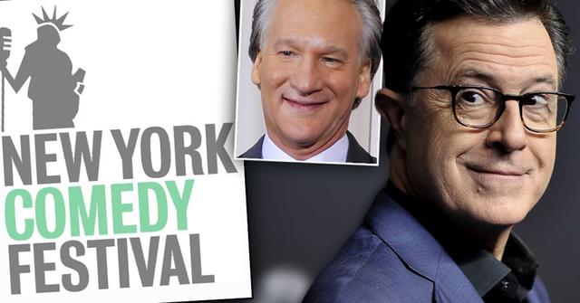 New York Comedy Festival Logo, Stephen Colbert Wearing Eye Glasses, Black Shirt and Blue Blazer Inset Bill Mahr Smiling Wearing White SHirt