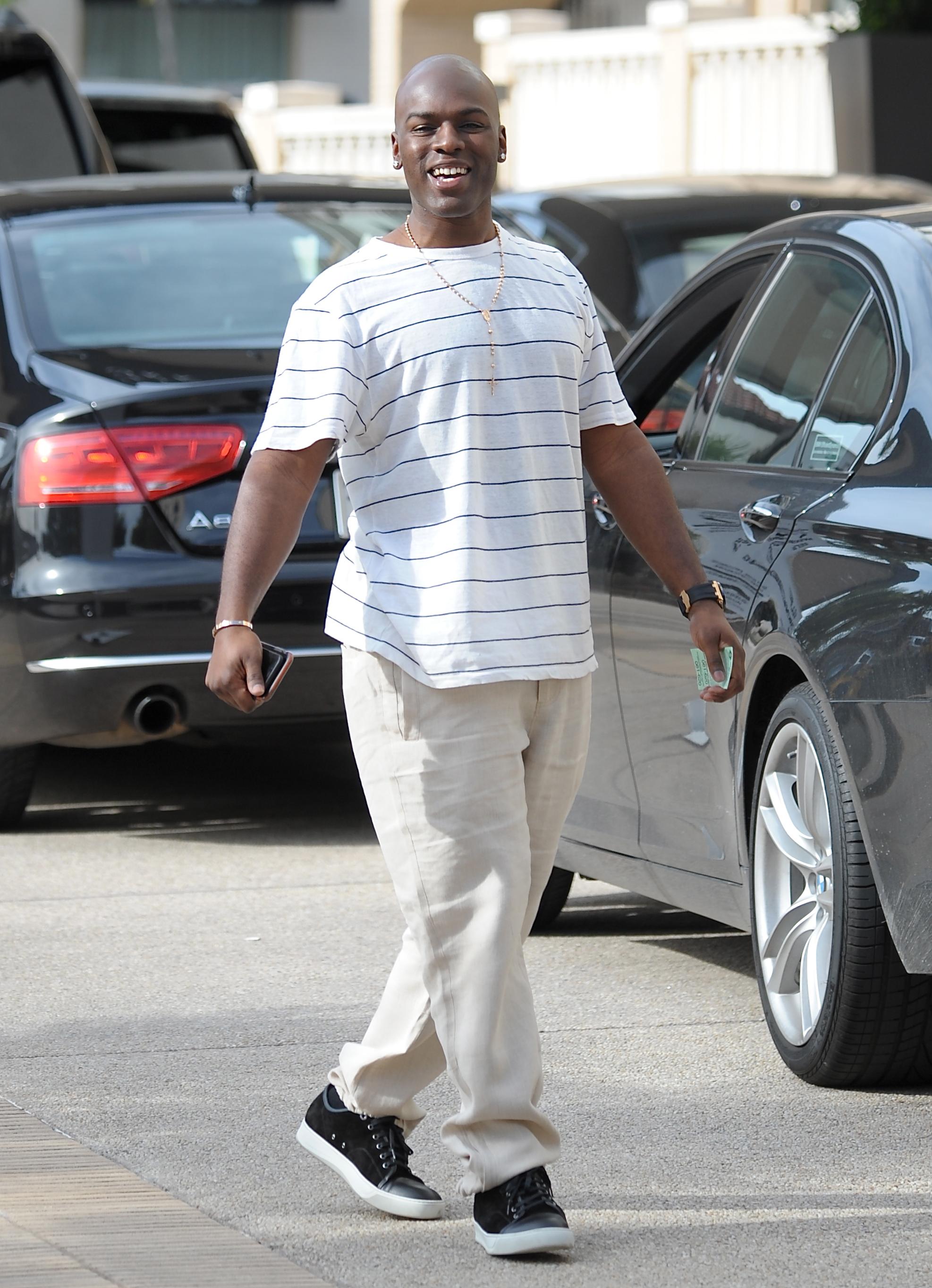 Corey Gamble arrives at Barneys New York in Beverly Hills