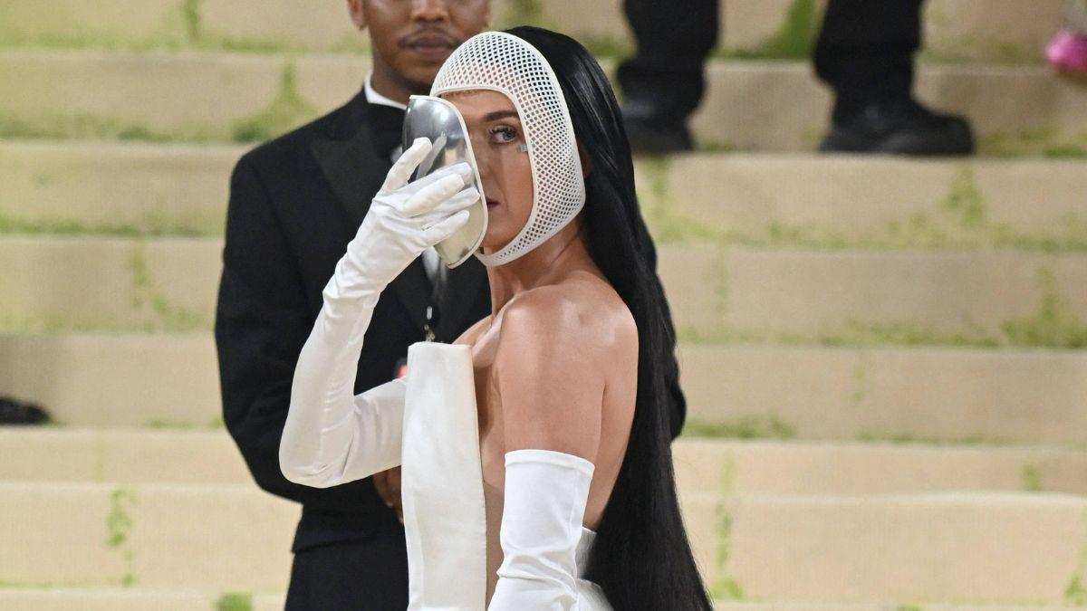 image of She revealed a six-finger glove on the carpet.
